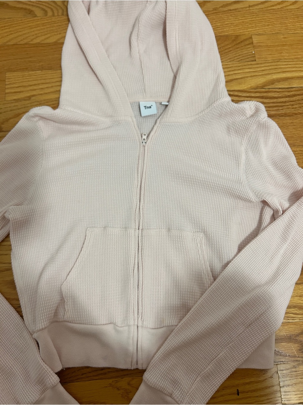 Aritzia TNA light pink waffle knit zip up hoodie